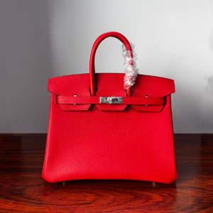 Birkin 25  Handcrafted Togo Leather in Ferrari Red with Silver Hardware Hand stitched Saddle stitch authentic hand-sewn sophisticated