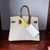 Birkin 25 Handcrafted authentic hand-sewn Togo Leather in Milkshake White & Gold, Gold Hardware Hand stitched Saddle stitch 11 Birkin 25 Handcrafted authentic hand-sewn Togo Leather in Milkshake White & Gold, Gold Hardware Hand stitched Saddle stitch