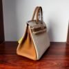 Birkin 25 Handcrafted authentic hand-sewn Togo Leather in Milkshake White & Gold, Gold Hardware Hand stitched Saddle stitch 12 Birkin 25 Handcrafted authentic hand-sewn Togo Leather in Milkshake White & Gold, Gold Hardware Hand stitched Saddle stitch