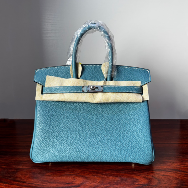 Birkin 25 Handcrafted Saddle stitch Togo Leather in Denim Blue with Silver Hardware Hand stitched authentic hand-sewn 1 Birkin 25 Handcrafted Saddle stitch Togo Leather in Denim Blue with Silver Hardware Hand stitched authentic hand-sewn